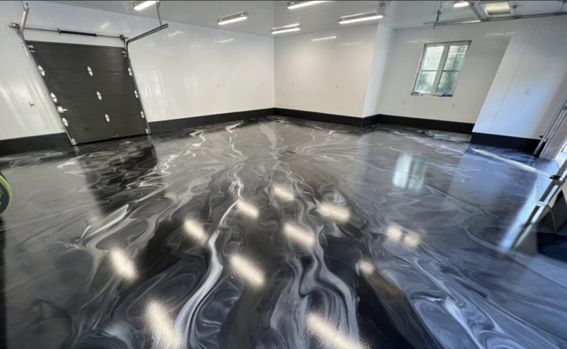 A shiny and durable epoxy floor in a modern garage.